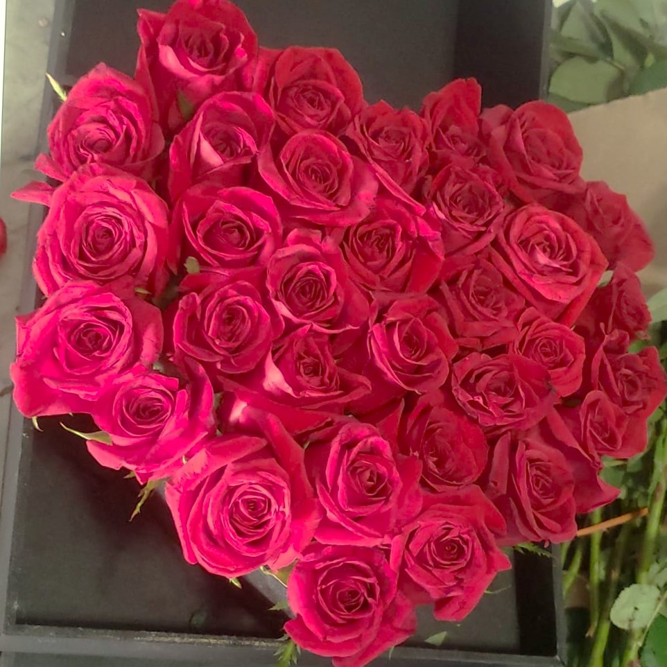 Ramo premium con flores en tonos naranja